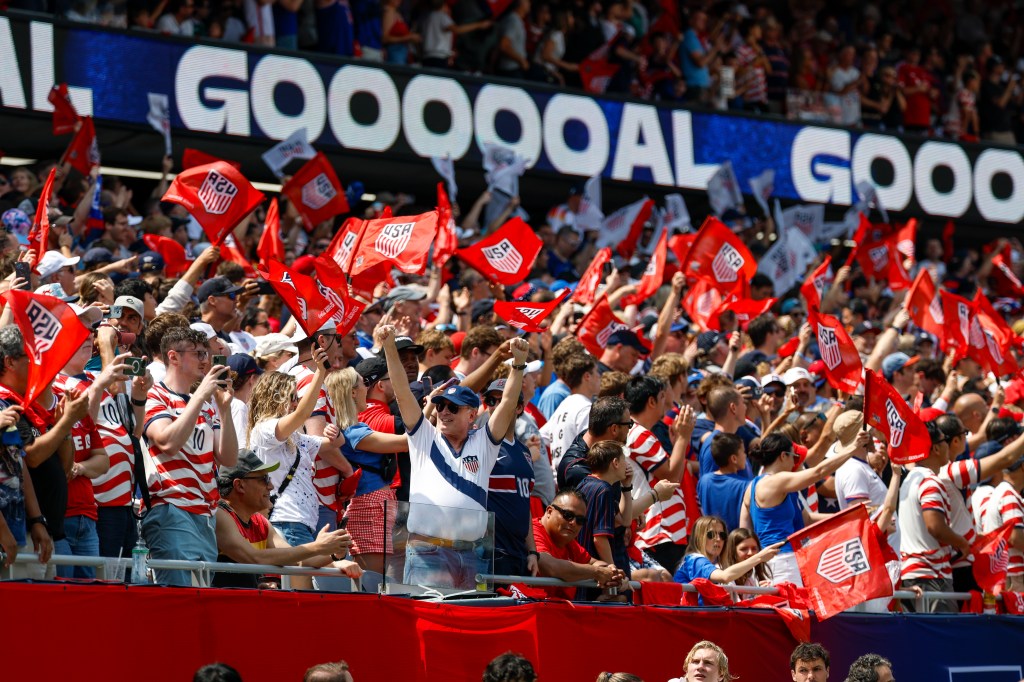 USA fans celebrating a goal at Soldier Field.