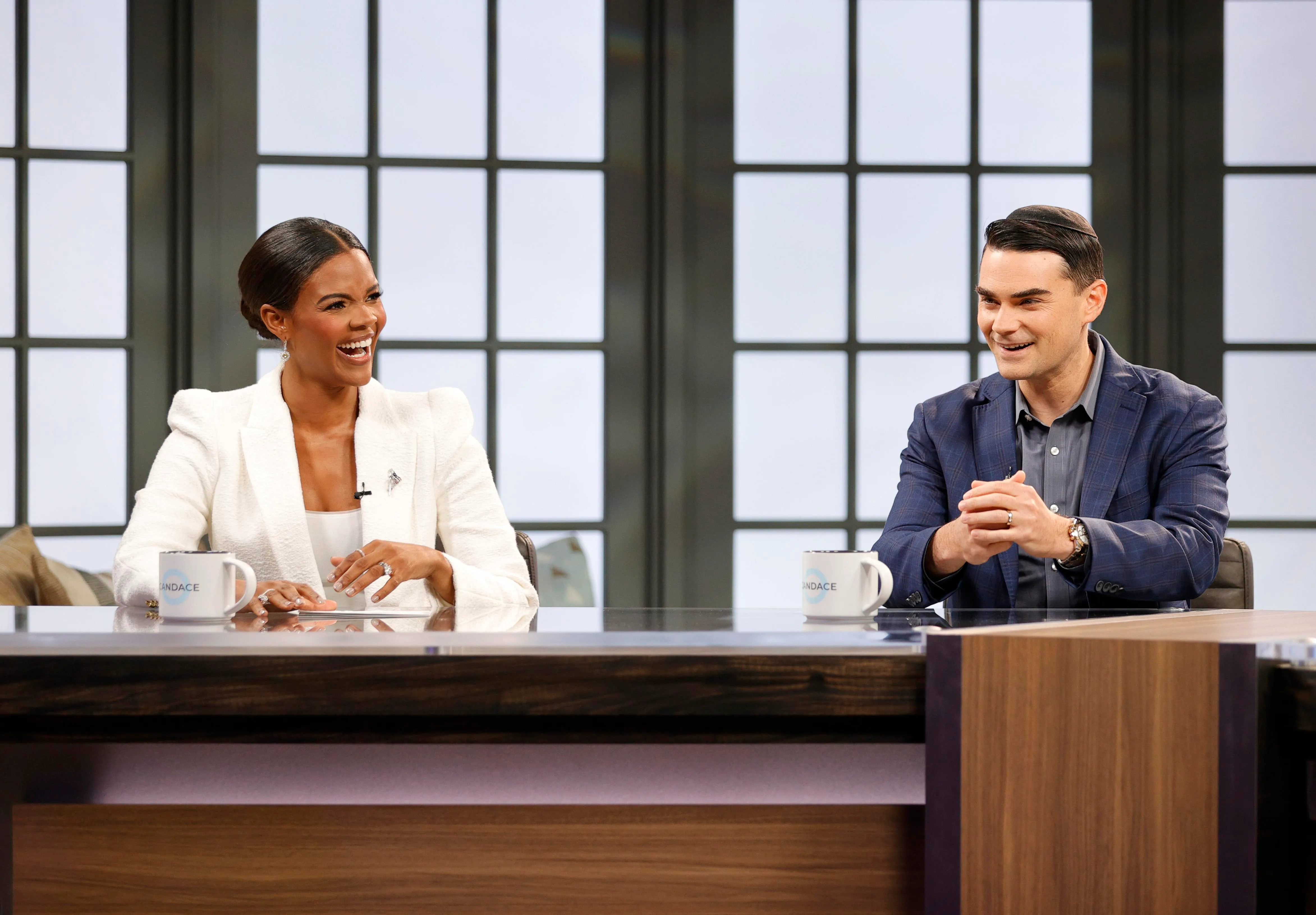 Candace Owens and American commentator Ben Shapiro on set during a taping of her show