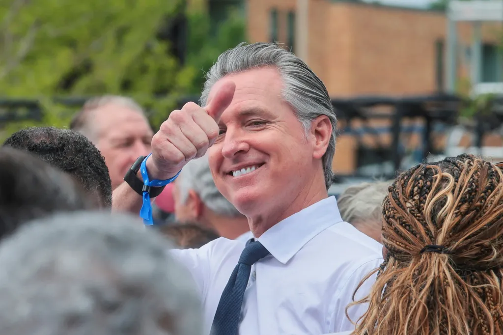 California Governor Gavin Newsom gives a thumbs up.