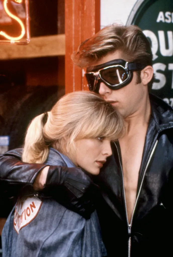 Michelle Pfeiffer and Maxwell Caulfield in a promotional still for Grease 2.