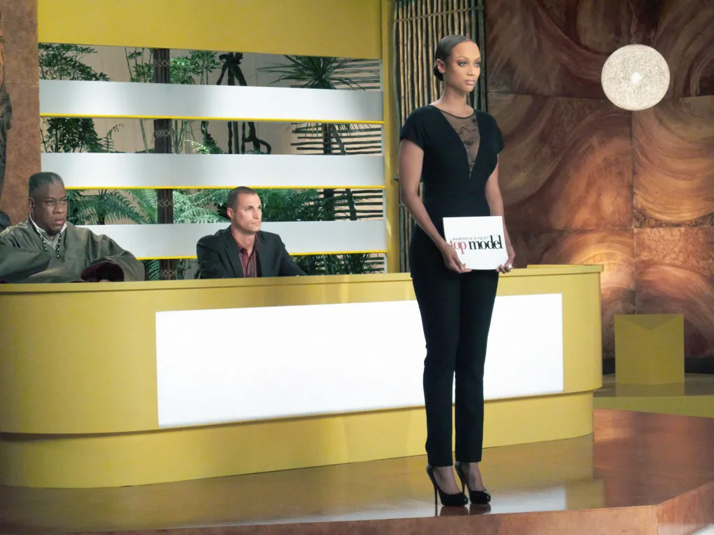 Andre Leon Talley, Nigel Barker, and Tyra Banks on the set of America's Next Top Model.