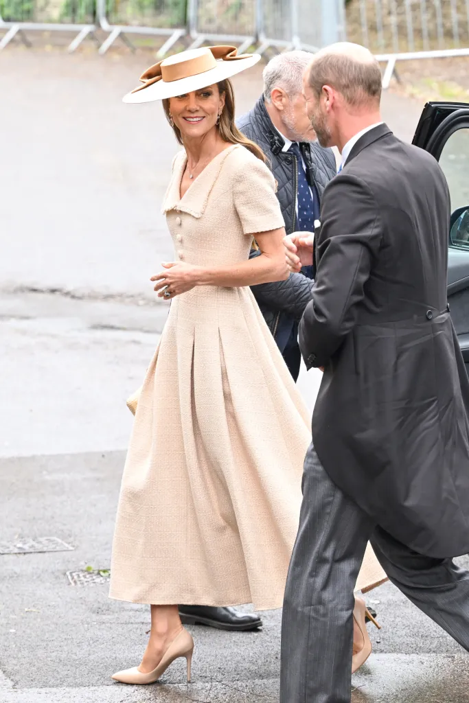 Catherine, Princess of Wales, in a cream dress and hat at Peter Phillips and Harriet Sperling's wedding.