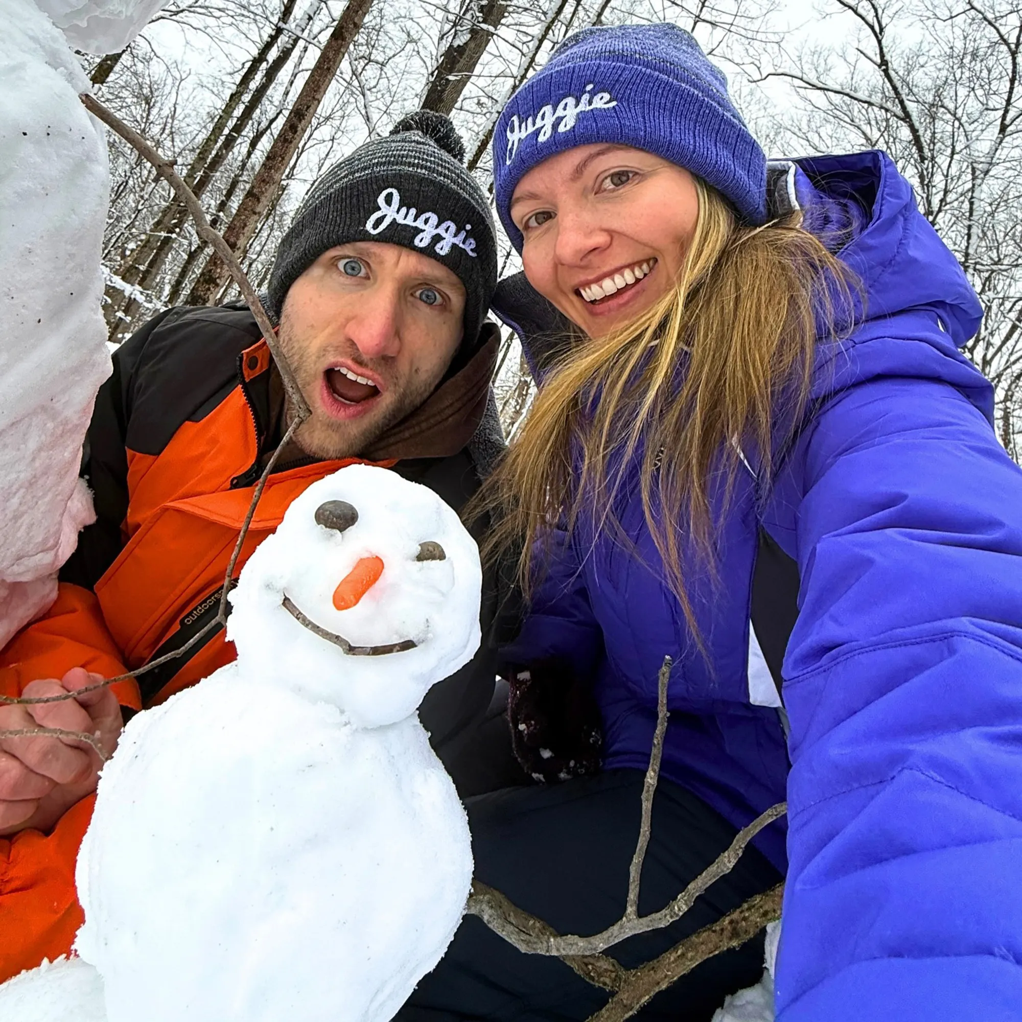  Jesse Ridgway and his wife, wearing beanies that say 