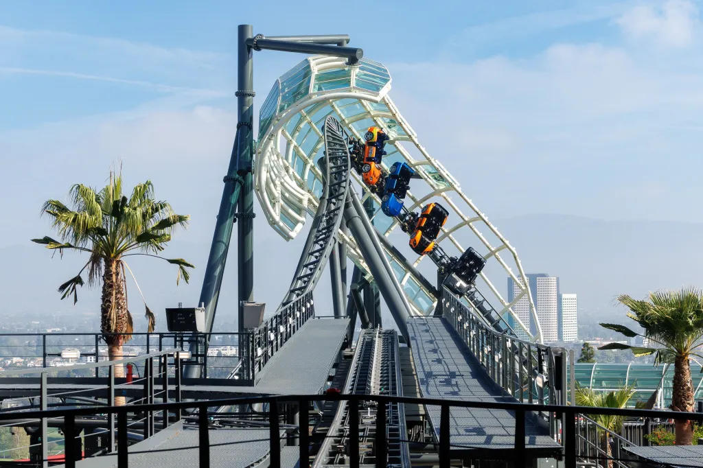 The Fast & Furious: Hollywood Drift rollercoaster at Universal Studios Hollywood, with its car-shaped ride vehicles visible on the tracks.