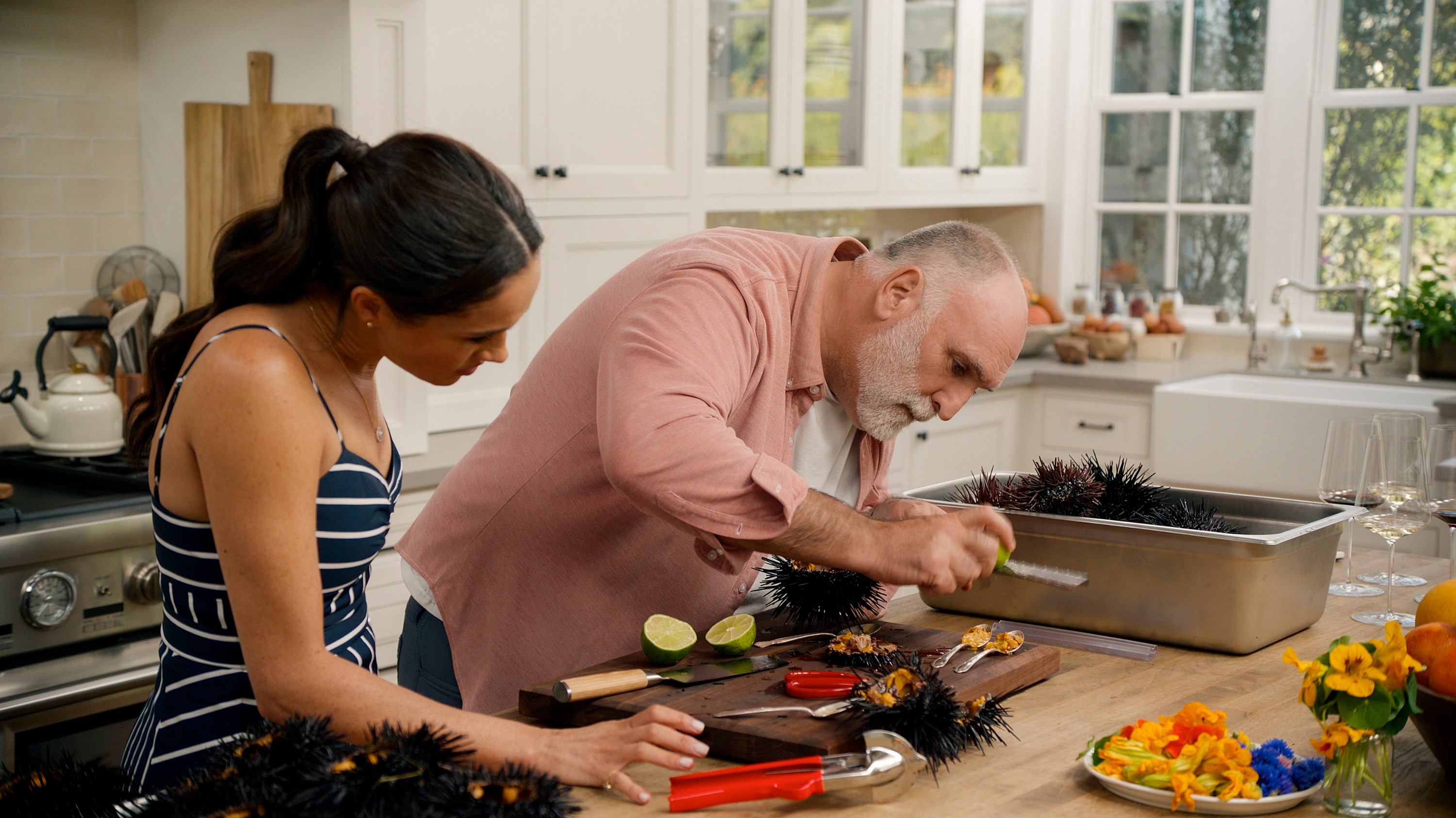 Meghan Markle and Jose Andres preparing sea urchin.