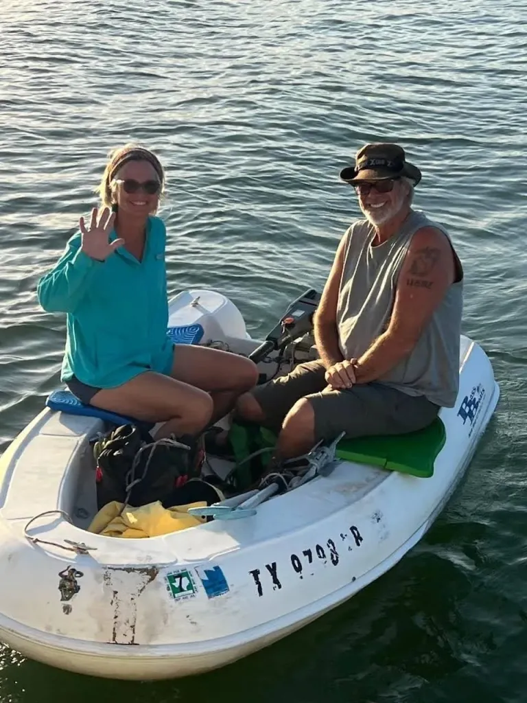 A picture of Lynette and Brian on a small boat.