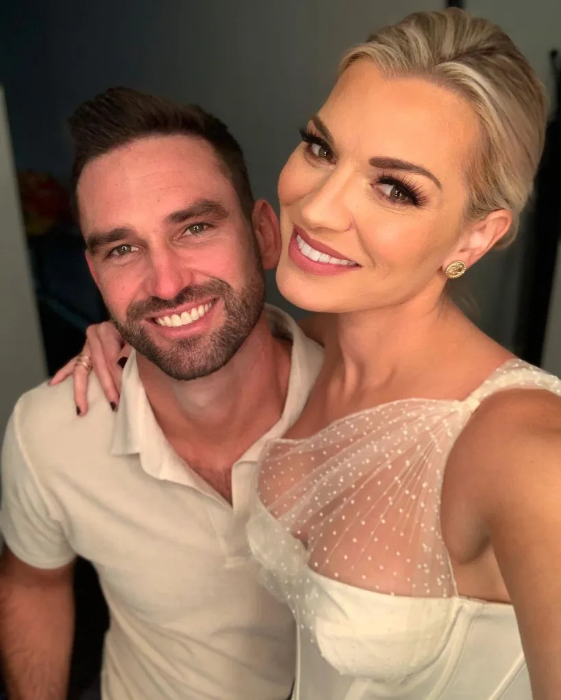 Lindsay Hubbard and Carl Radke smiling at the camera.