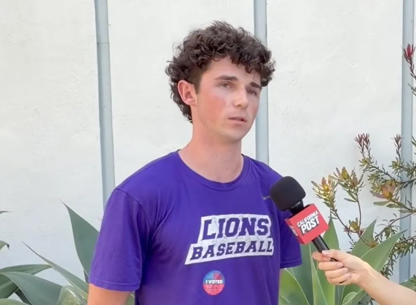 Ian Sullivan, a 19-year-old, being interviewed about his vote in an election.