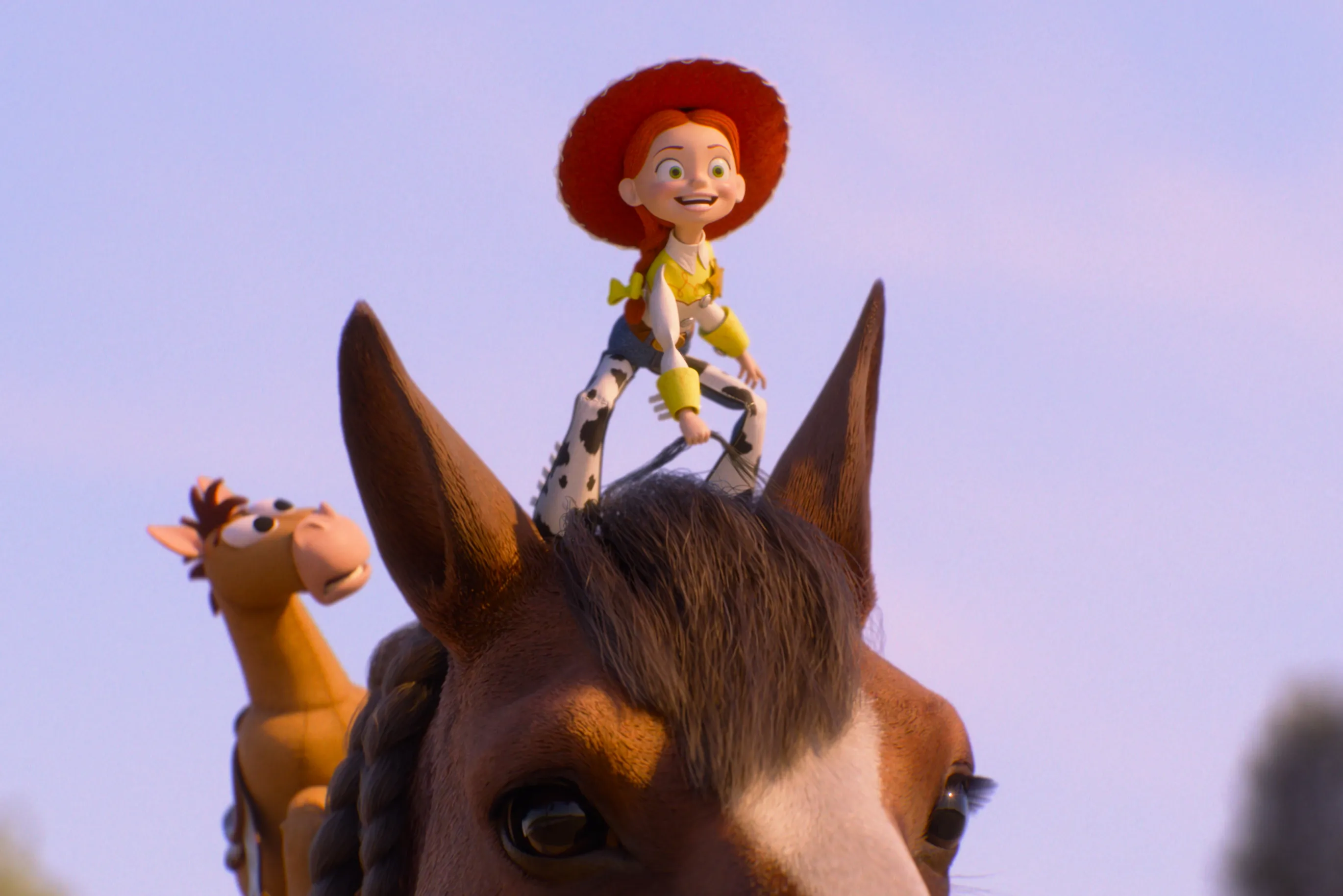 Illustration of Jessie standing on top of Bullseye's head, both looking forward.