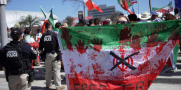 Support for Iran’s team – but not for regime
