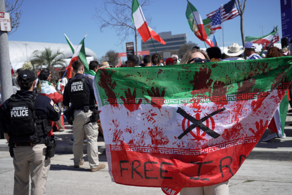 Support for Iran’s team – but not for regime