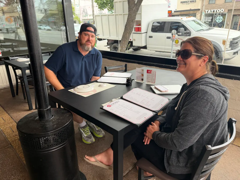 James Spratt and Angie Revell eating sushi at Dojo Sushi.