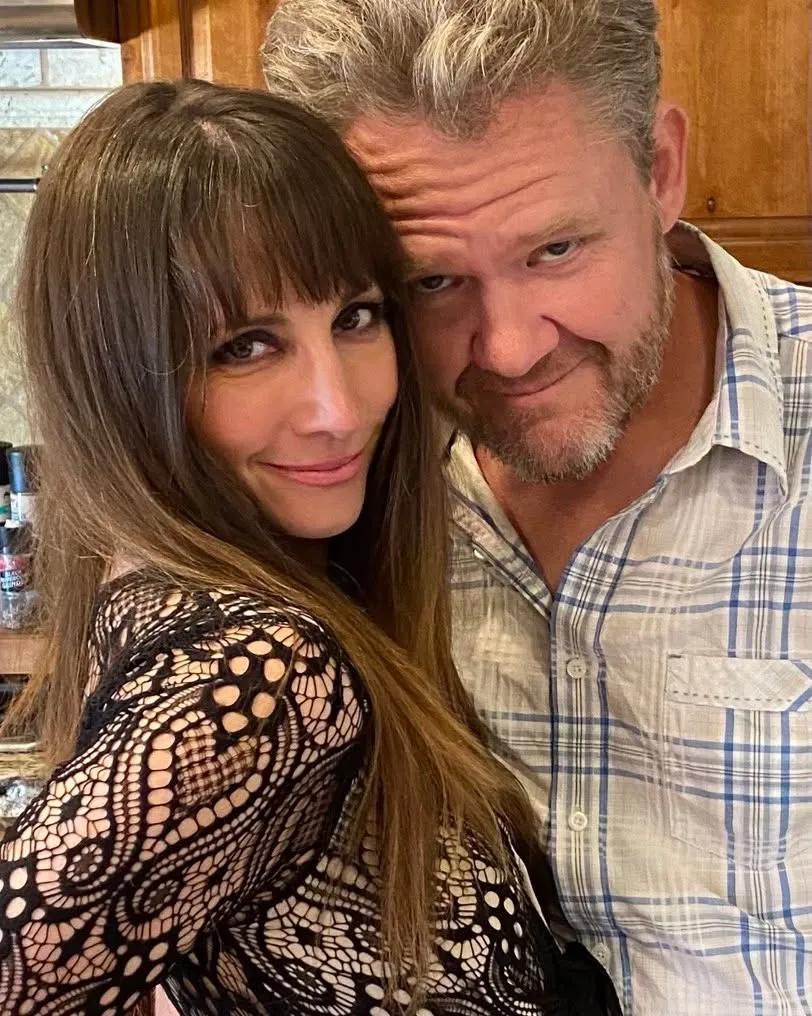 Heather McComb and Scott Michael Campbell posing together.