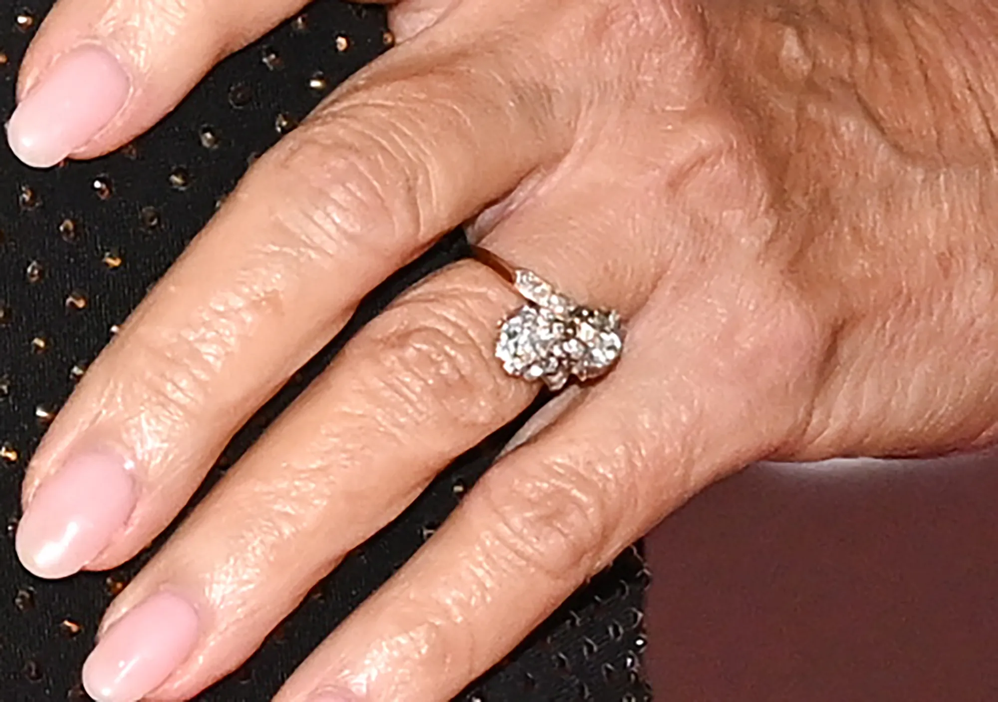 Close-up of Jane Seymour's hand wearing an engagement ring.