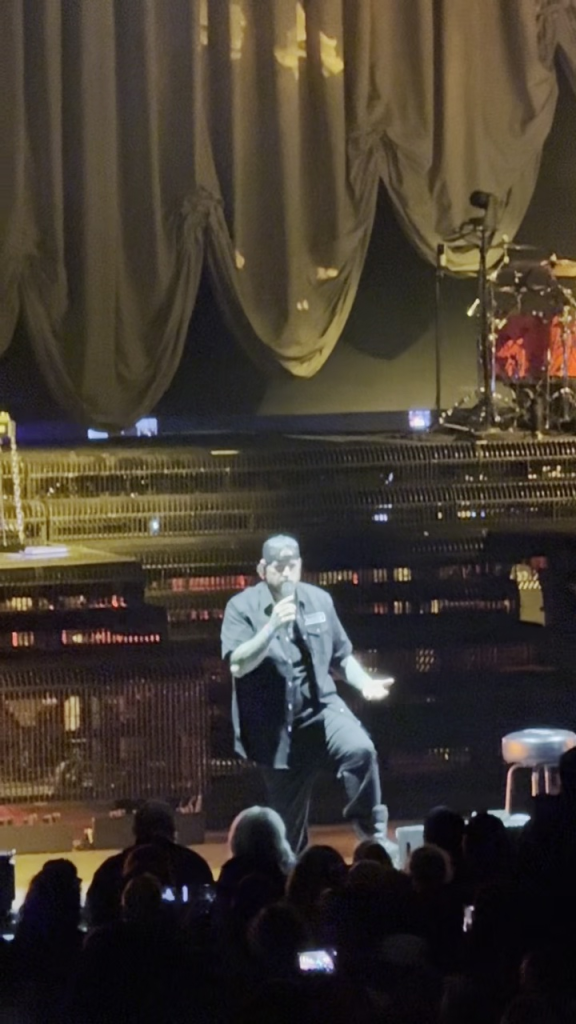 Jelly Roll performing on stage in Sarasota Springs, NY.