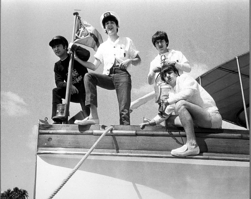 The Beatles, John Lennon, Paul McCartney, George Harrison, and Ringo Starr, on a yacht in Miami, Florida.