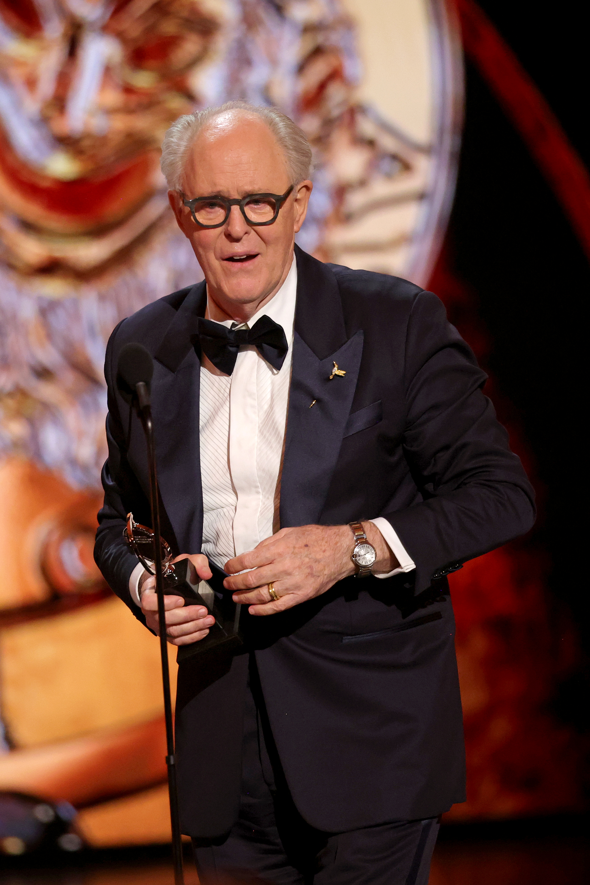 John Lithgow giving a speech at the 2026 Tony Awards