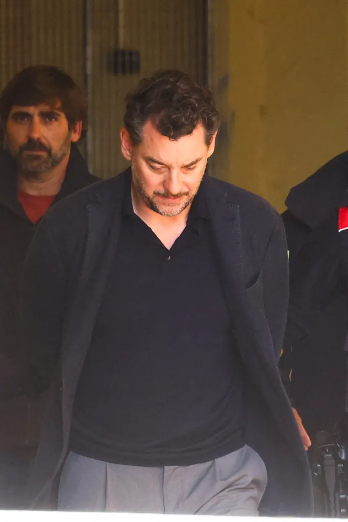 Jonathan Andic, son of the Mango fashion group founder, escorted by police.