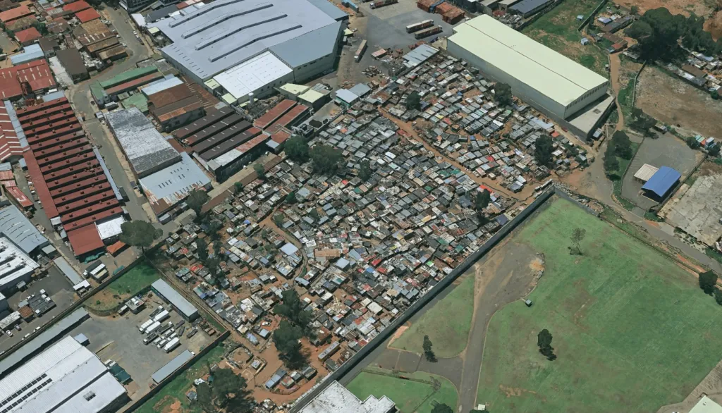 Multiple attackers killed 12 people and wounded at least nine others in a late-night mass shooting in the South African city of Johannesburg, police said Wednesday.