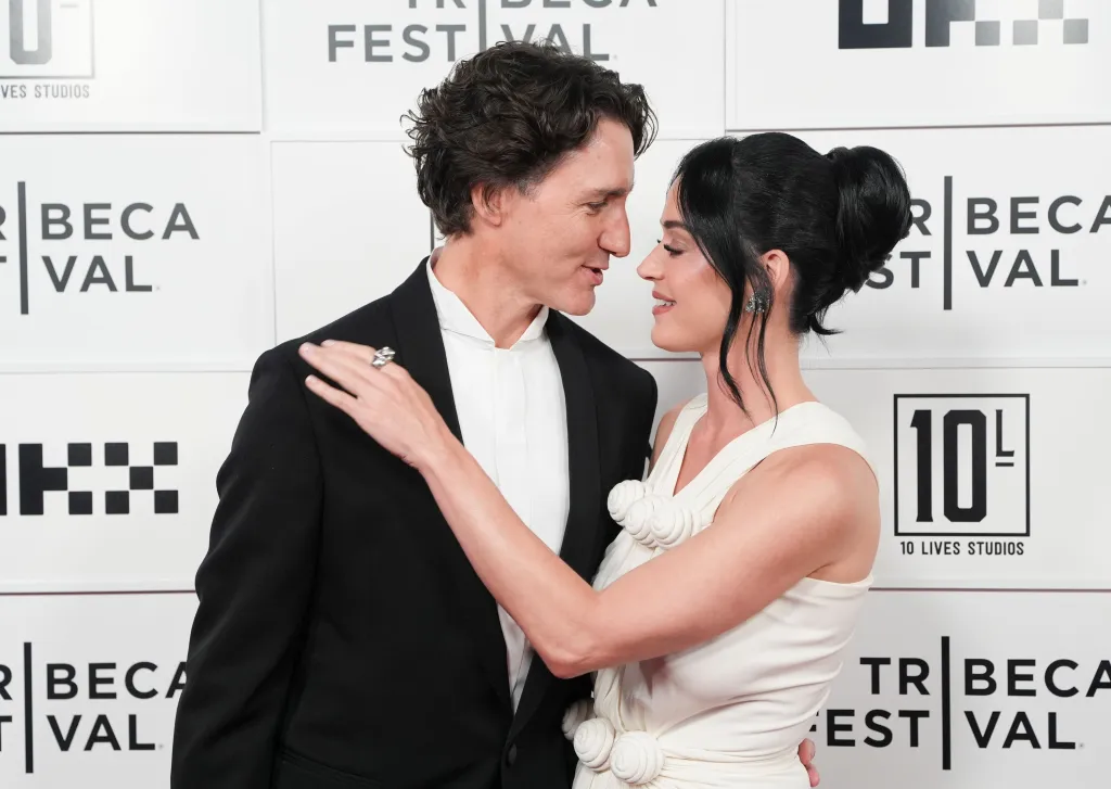 Justin Trudeau and Katy Perry embracing at the 'Katy Perry The Lifetimes Tour - Live from Paris' World Premiere.