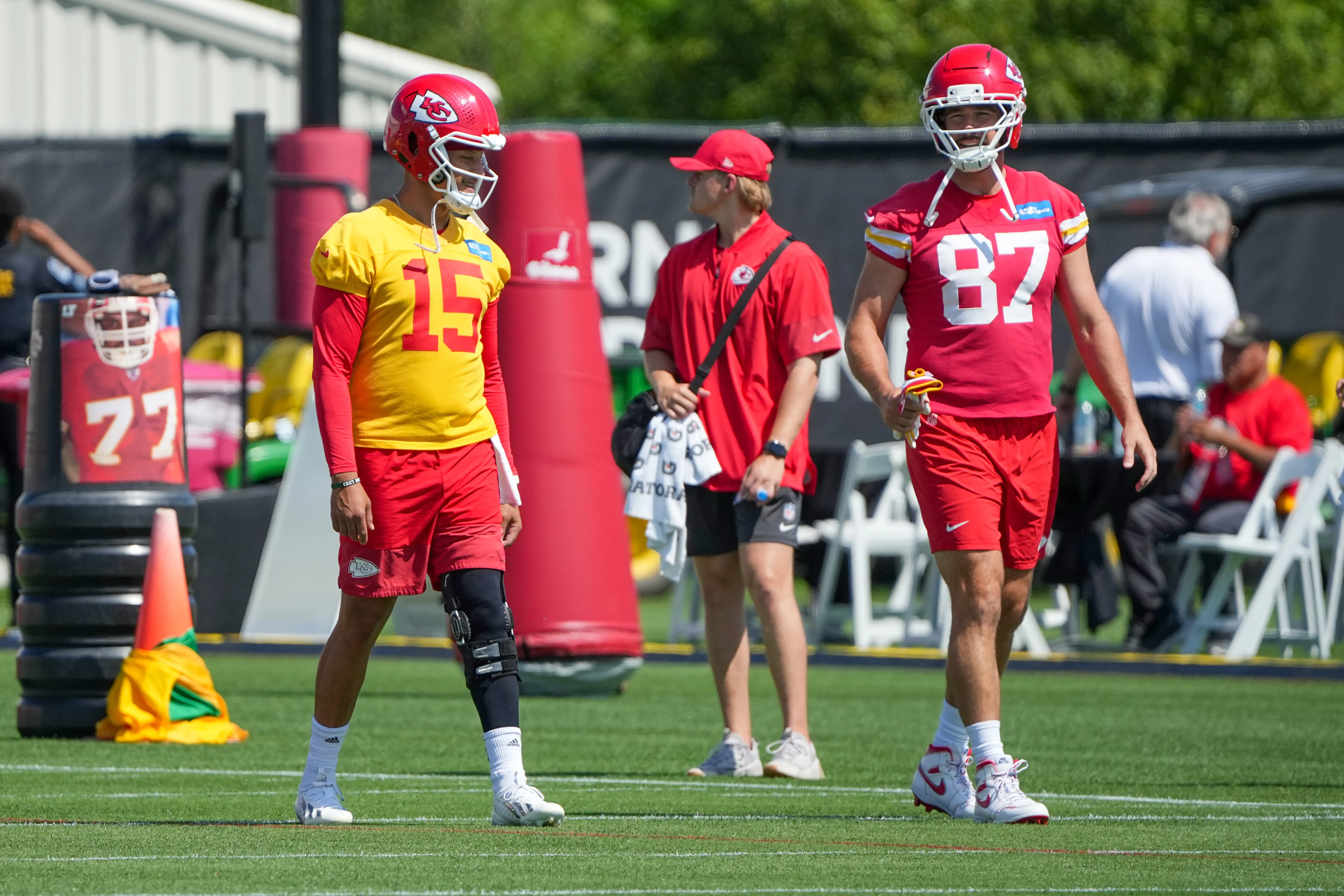 Kansas City Chiefs quarterback Patrick Mahomes (15) and tight end Travis Kelce (87) on the field during a mandatory mini-camp.