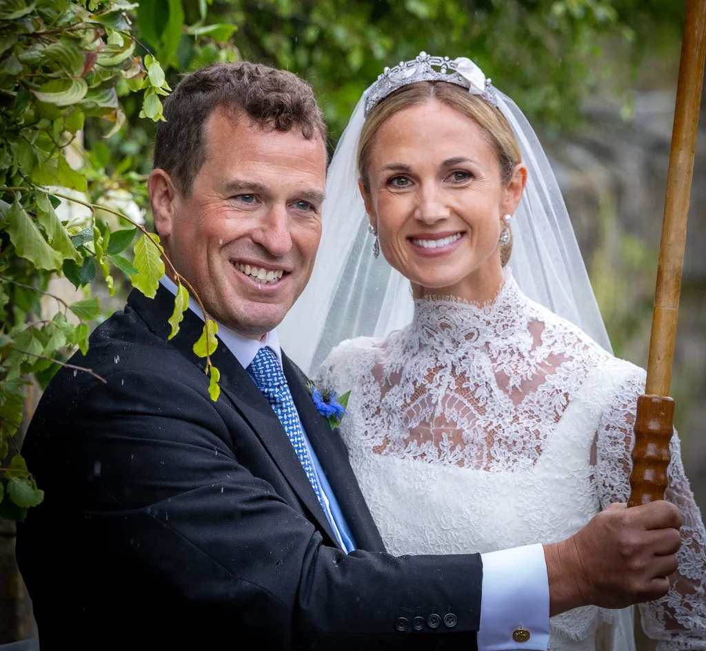 Peter Phillips and Harriet Sperling smiling after their wedding ceremony.