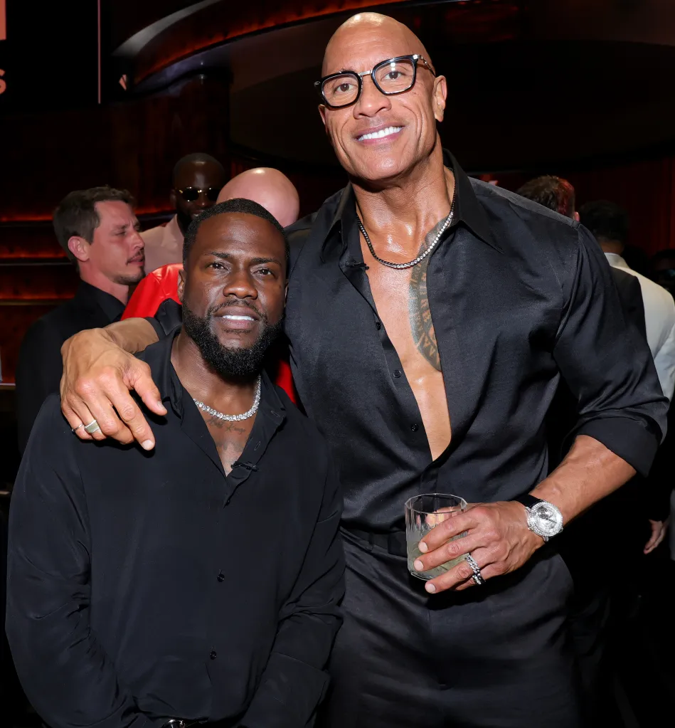 Kevin Hart and Dwayne Johnson posing together at Netflix Is A Joke Festival.