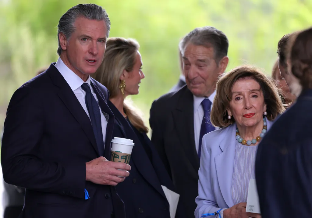 California Gov. Gavin Newsom and former Speaker of the House Nancy Pelosi attend the dedication ceremony for the opening of the Barack Obama Presidential Center.