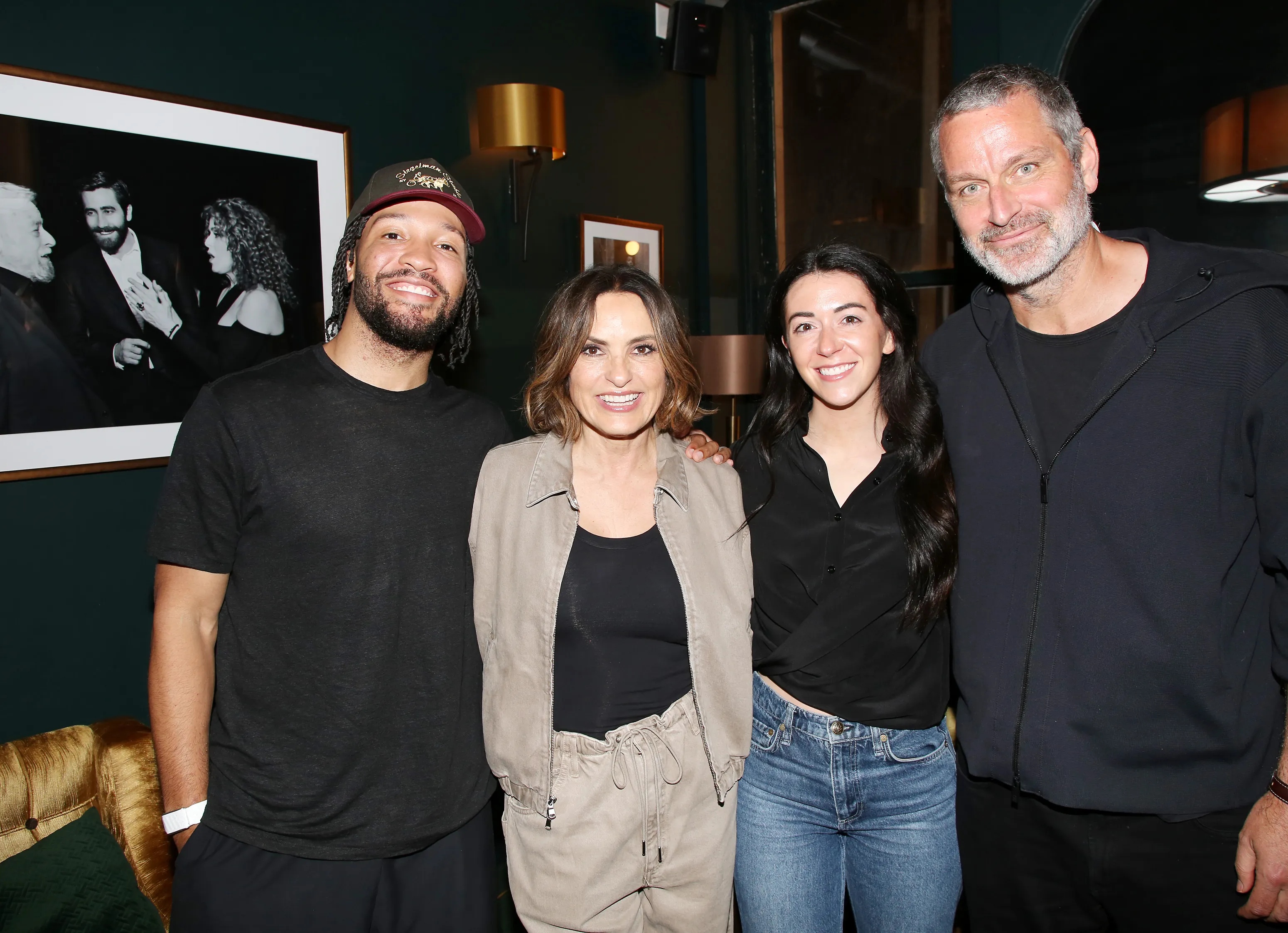 Jalen Brunson, Mariska Hargitay, Ali Marks, and Peter Hermann pose together backstage at 