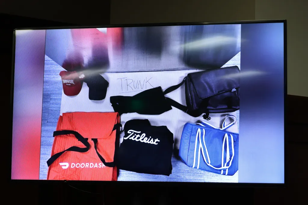 Evidence from a criminal case including a DoorDash bag, Titleist apparel, and other items from a South American organized crime ring.