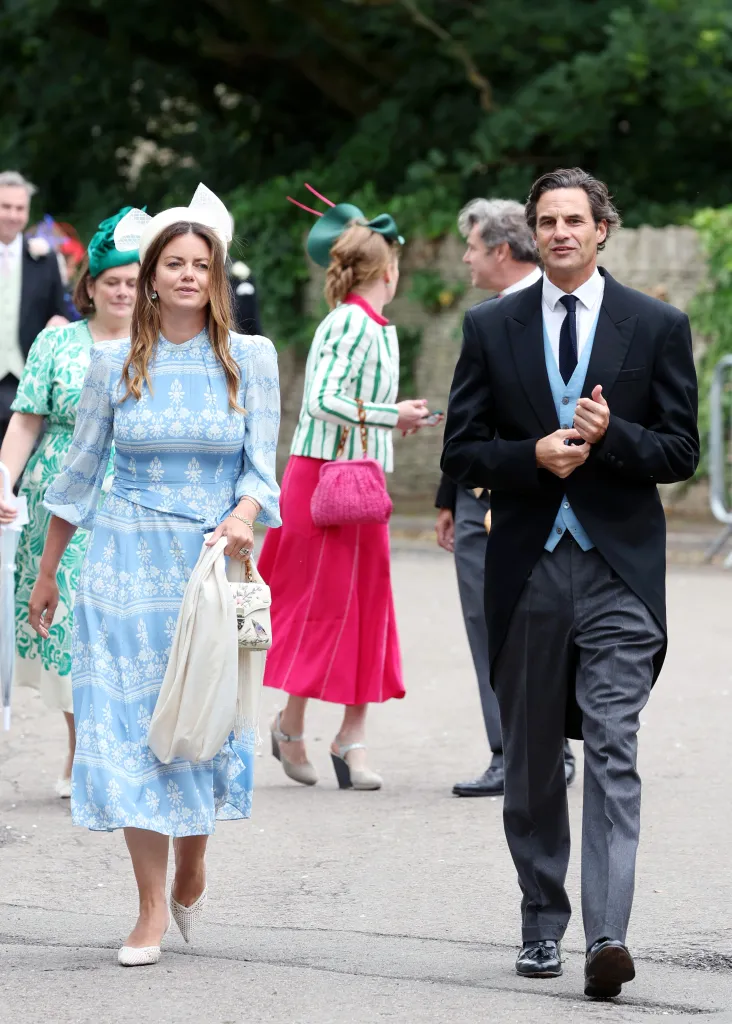 Lady Natasha Rufus Isaacs and Rupert Finch attending the royal wedding of Peter Phillips and Harriet Sperling.