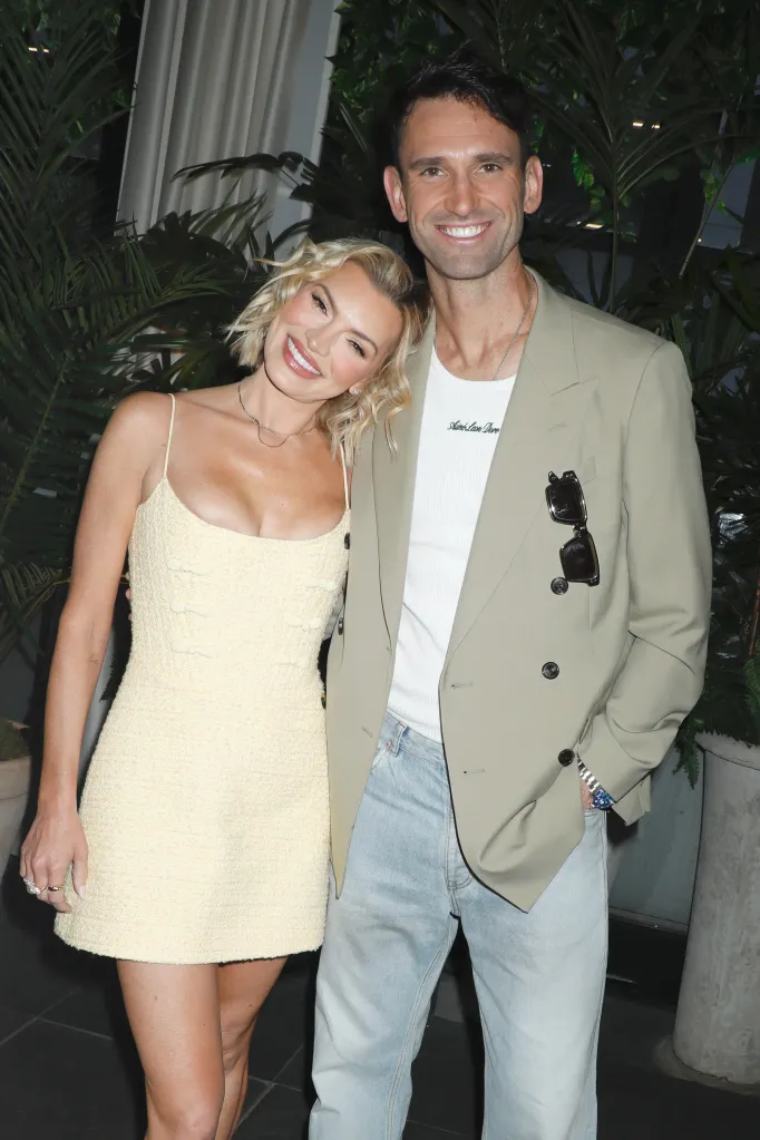 Lindsay Hubbard and Carl Radke smiling for a photo.
