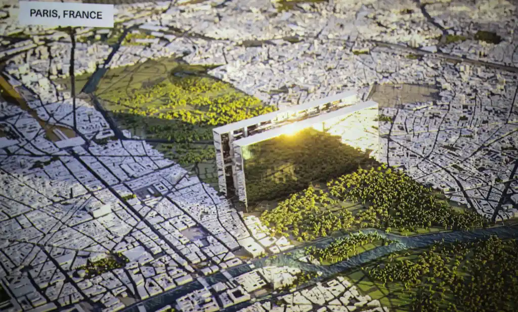 Illustration of a futuristic mirrored building called 