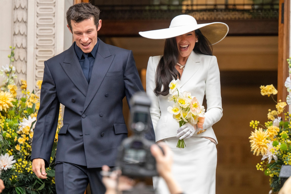 Dua Lipa and Callum Turner leaving their wedding ceremony.