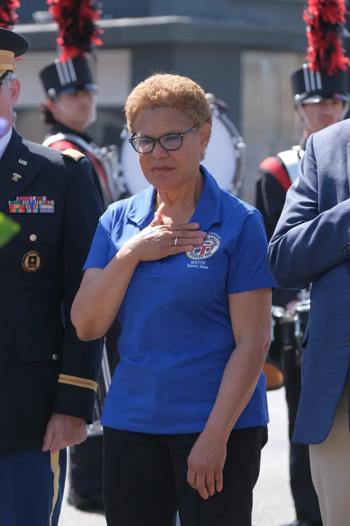 Los Angeles Mayor Karen Bass attending the Memorial Day parade in Canoga Park, with her hand over her heart.