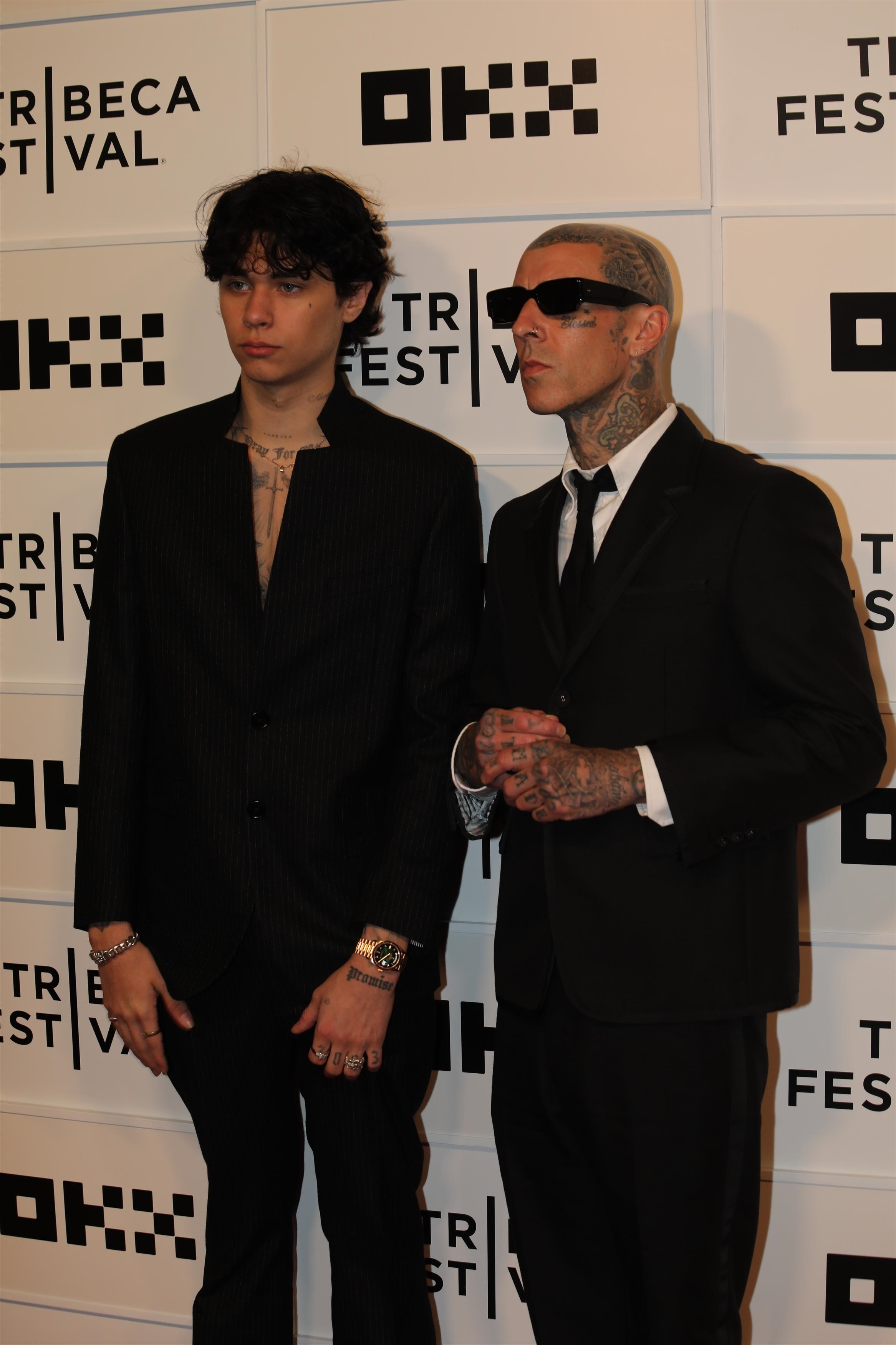 Landon and Travis Barker attend the premiere of