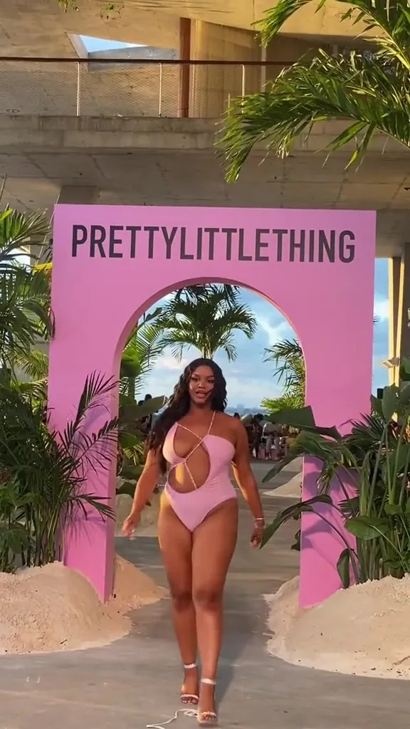 Melanie Moreno modeling a pink swimsuit for PrettyLittleThing.