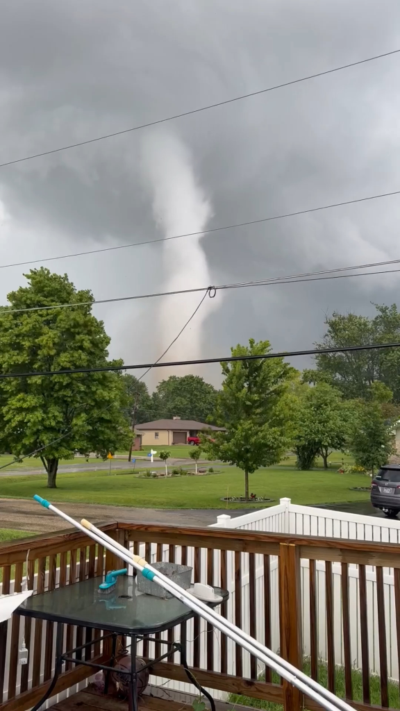 At least three tornadoes battered communities outside Chicago on Thursday, leveling homes and ripping down trees and power poles