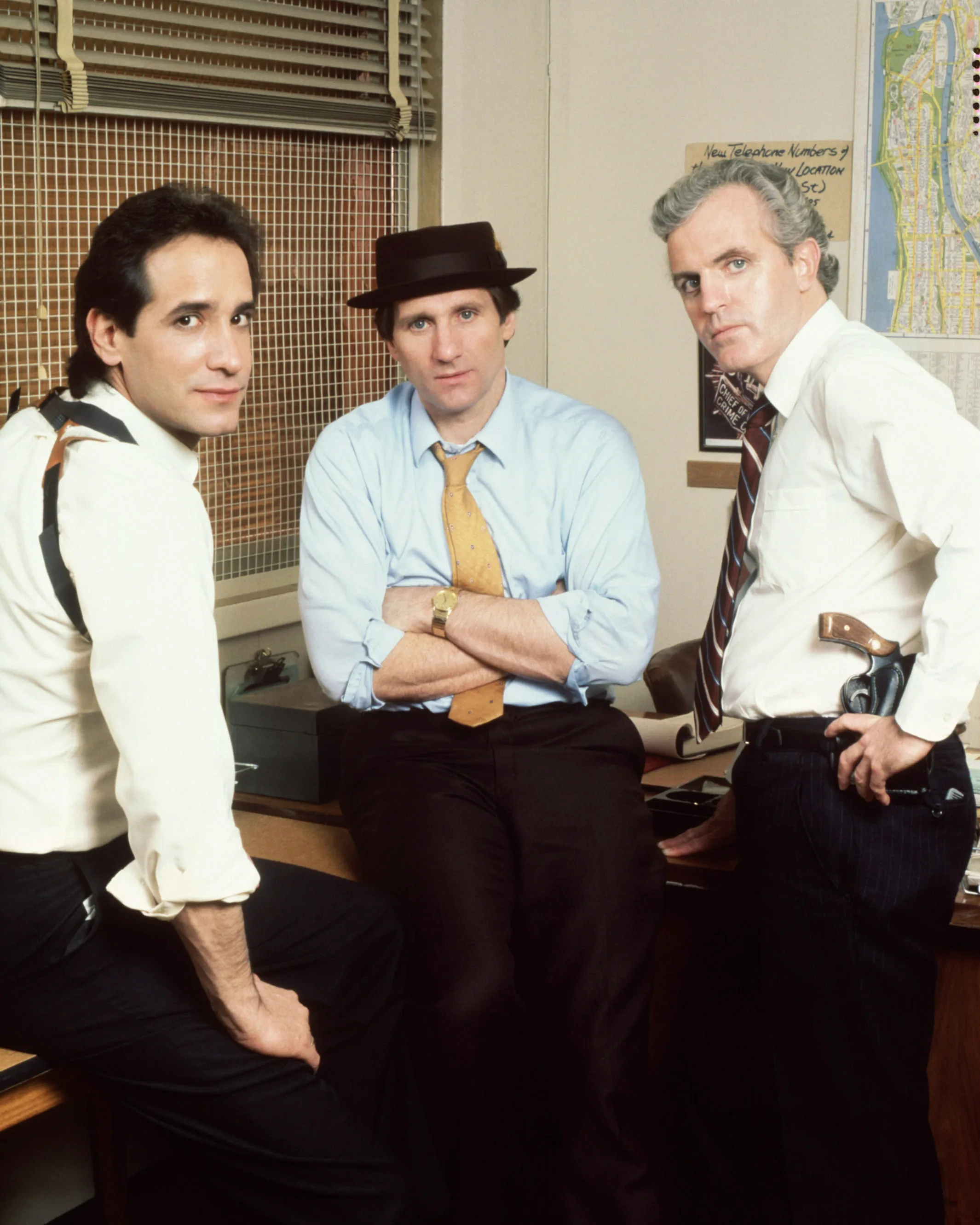 Cast shot of Matthew Laurance, Ed O'Neill, and James Handy as detectives.