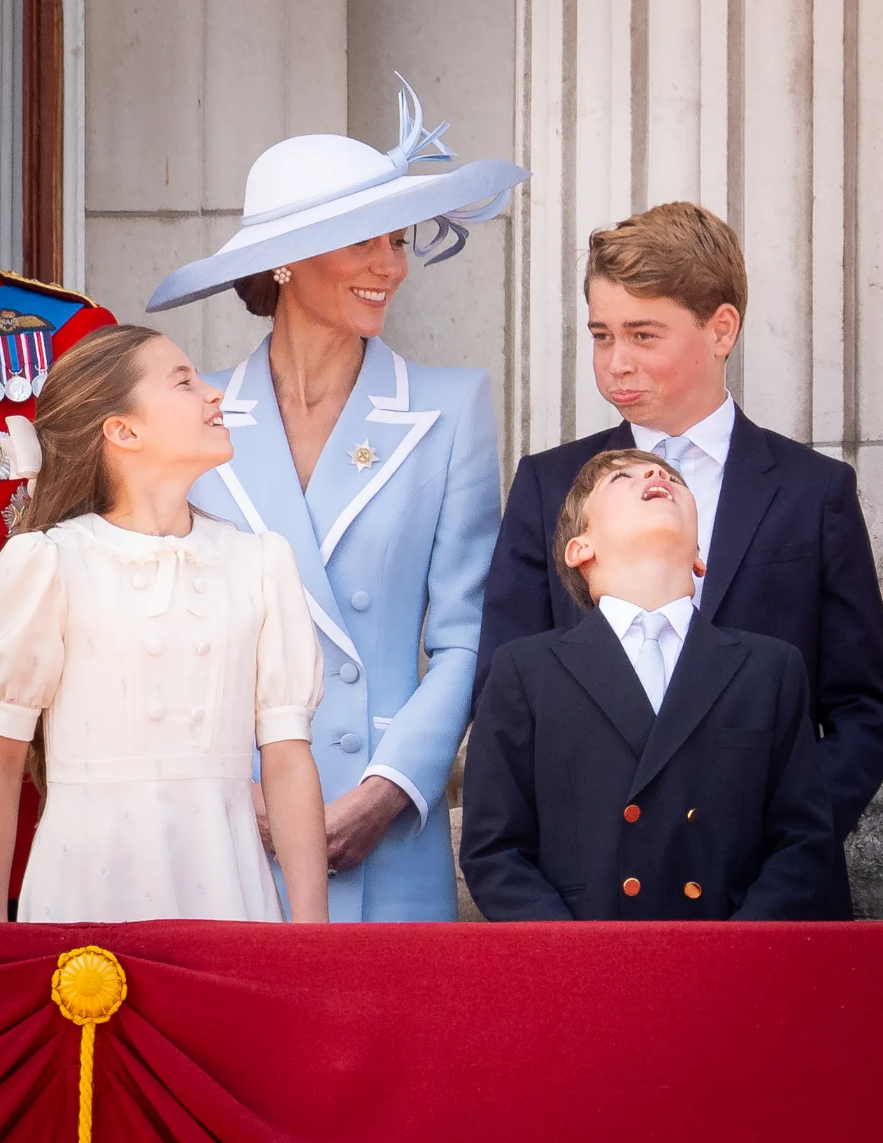 Princess Catherine, Princess Charlotte, Prince George, and Prince Louis watching the flypast at Trooping the Colour.