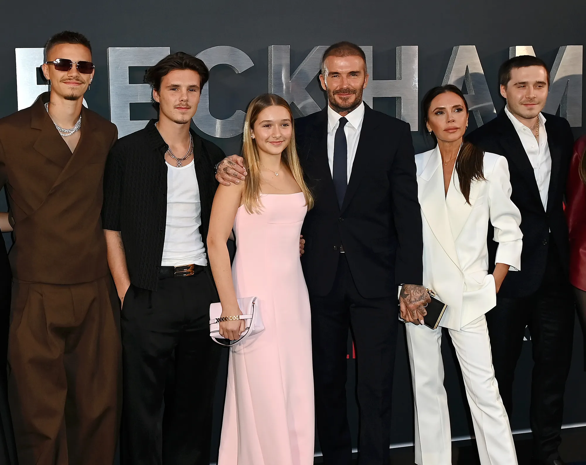 Cruz Beckham, Mia Regan, Romeo Beckham, David Beckham, Victoria Beckham, and Brooklyn Beckham attend the 