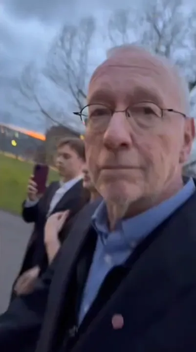 The students recorded themselves hounding Kotlikoff after the event in Ithaca, NY.
