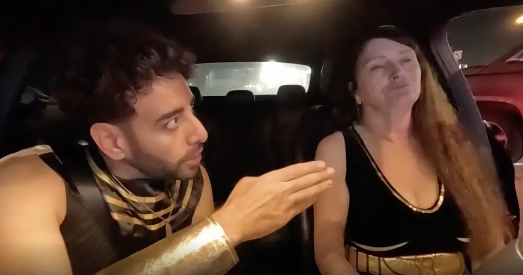Mido and Debby arguing in a car.