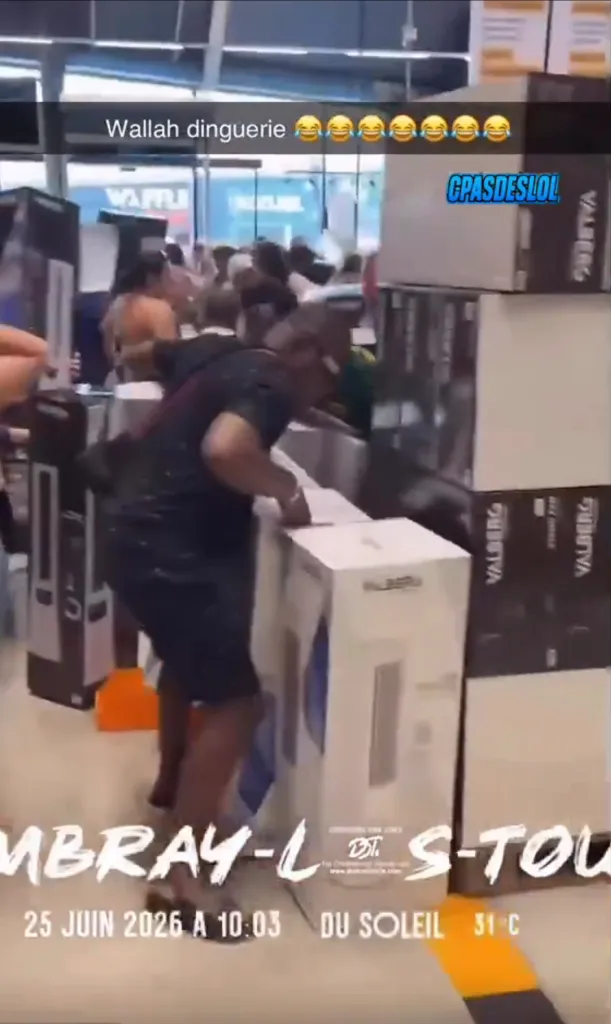 Shoppers frantically grabbing air conditioning units from a store display.