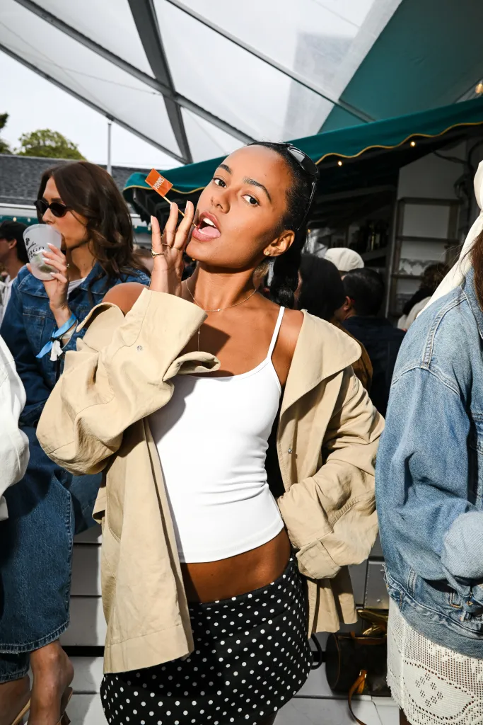 Ava Dash posing at The Surf Lodge concert series.