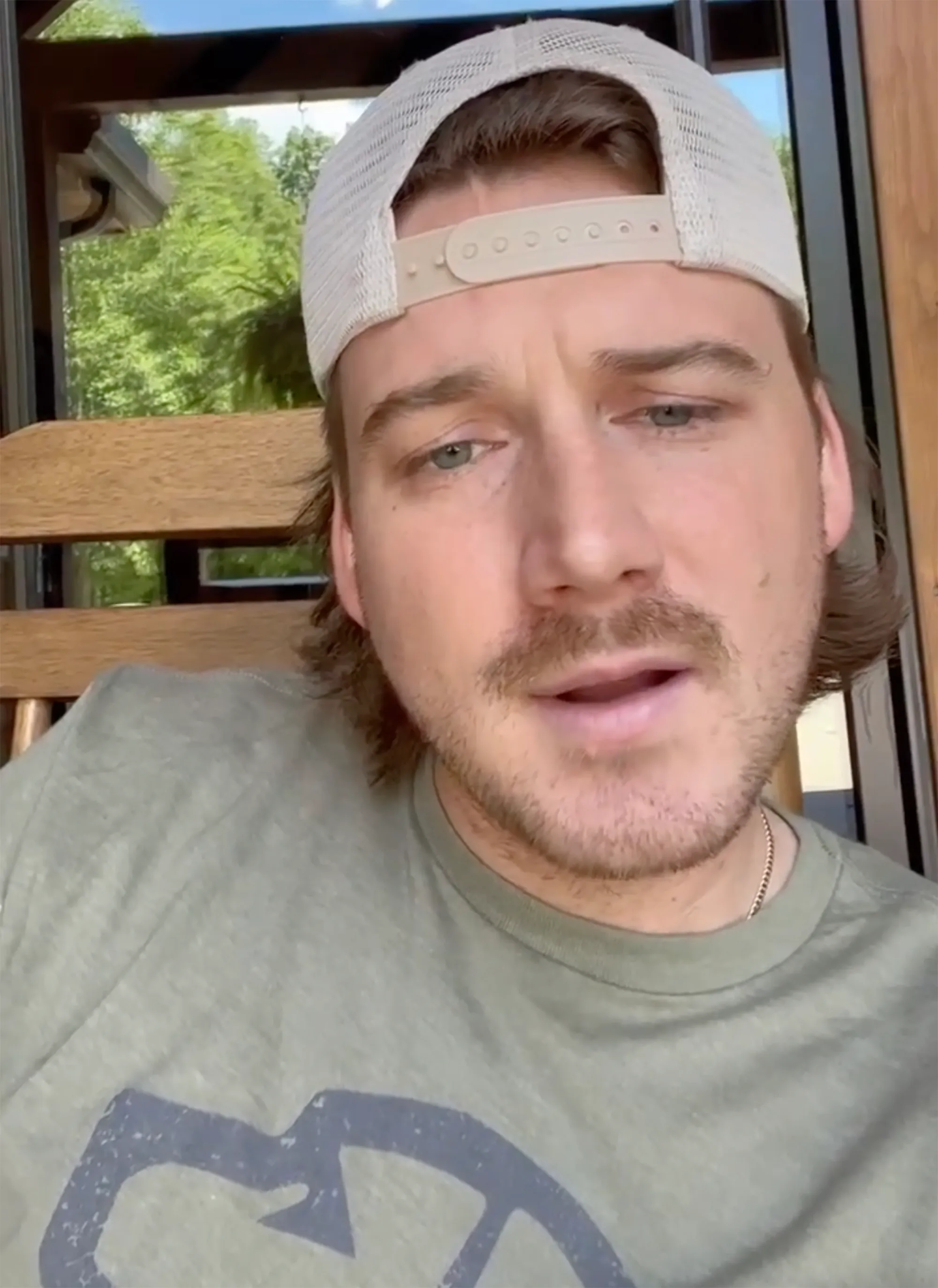 Country singer Morgan Wallen speaking directly into the camera.