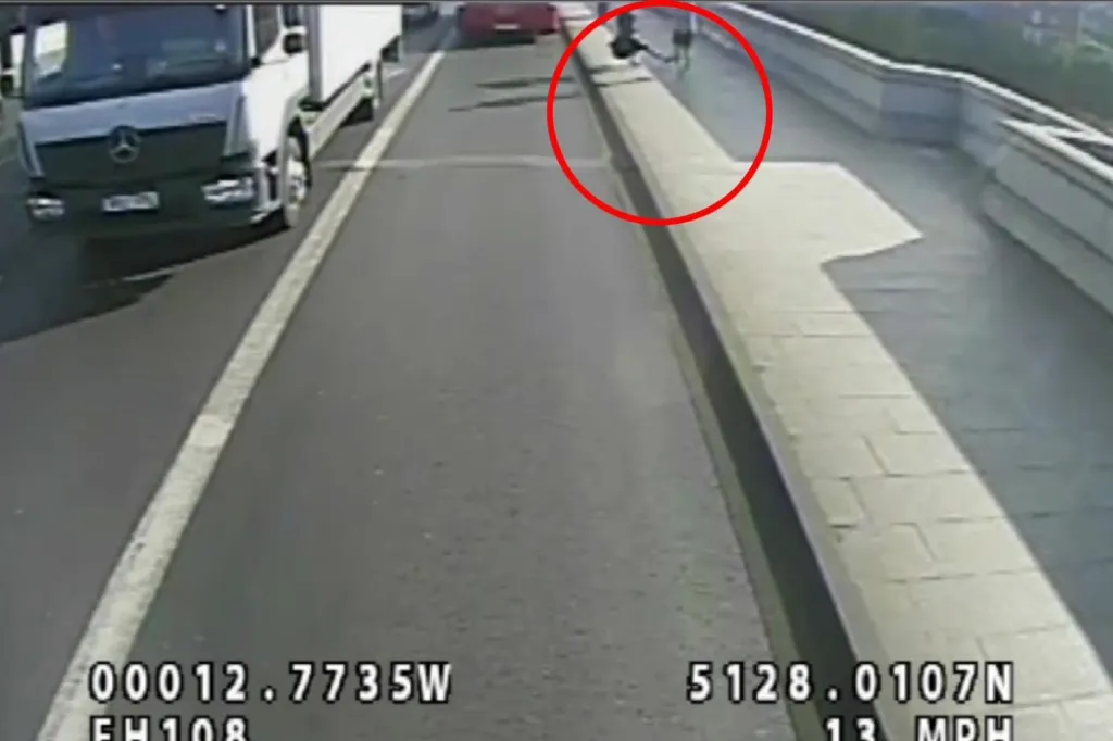 The bus missed striking the woman's head by inches.