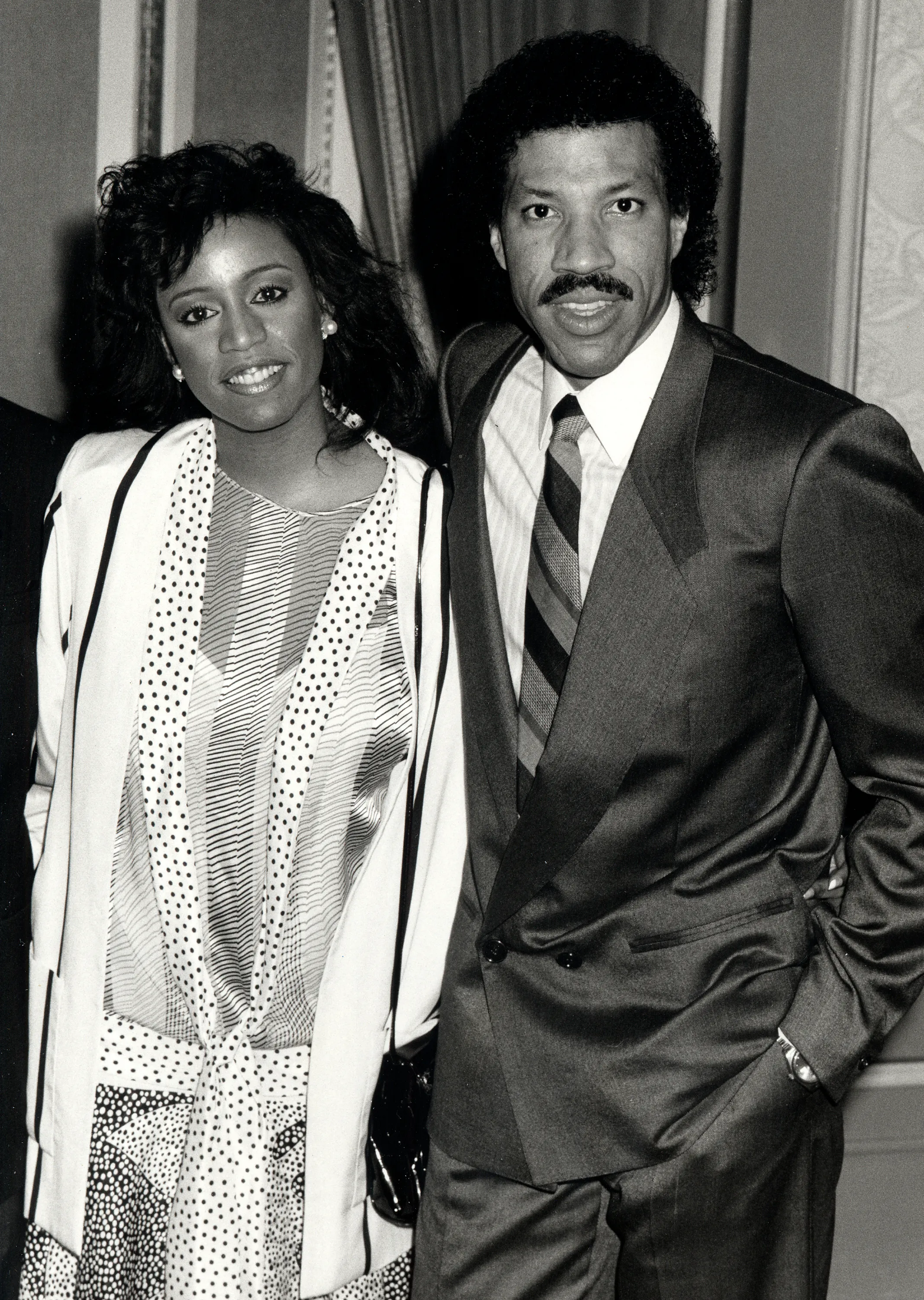 Musician Lionel Richie and Brenda Harvey at the 58th Annual Academy Awards nominees luncheon in 1986.