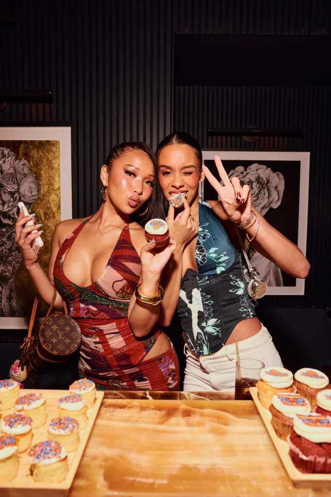 Jordyn Woods and friend at the New York Knicks NBA Championship celebration at Flyfish Club.