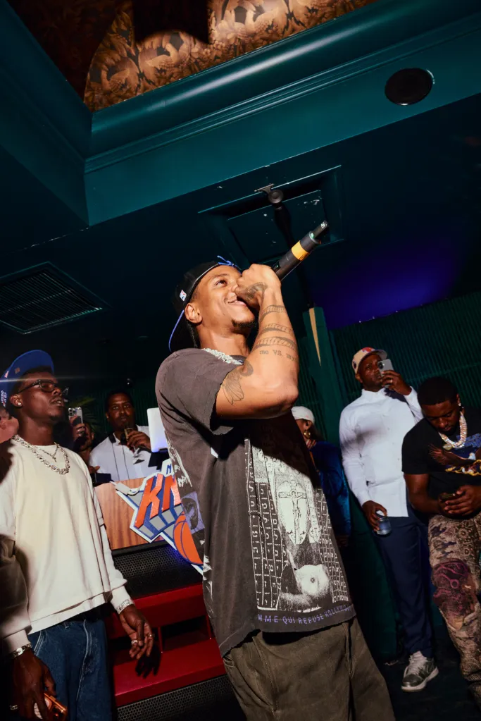 A Boogie wit da Hoodie performing on stage at the New York Knicks celebration.